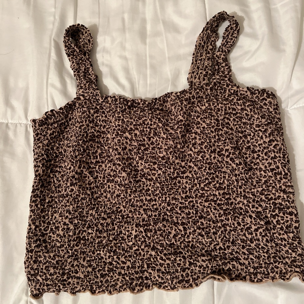 Leopard print cropped tank top.